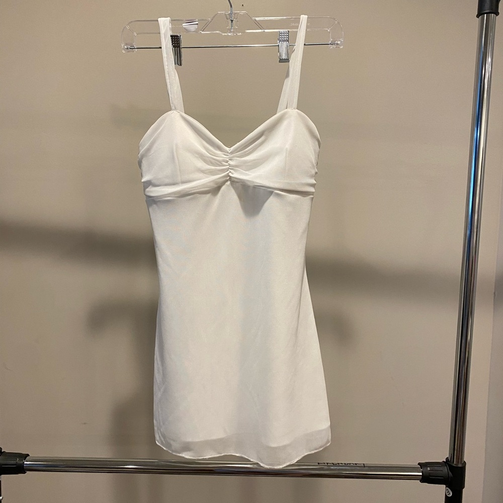 Adorable white mini dress from DEB